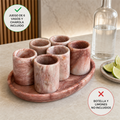 Juego de 6 vasos de mármol rosa con charola
